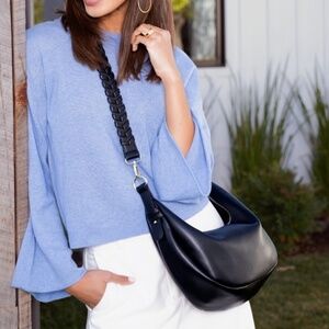 Jules Kae,  cross body, vegan leather. Braided strap w golden hardware